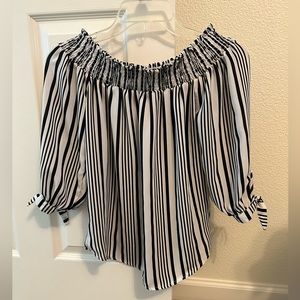 Like new: Black and white striped off shoulder top